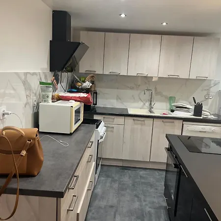 Maison *